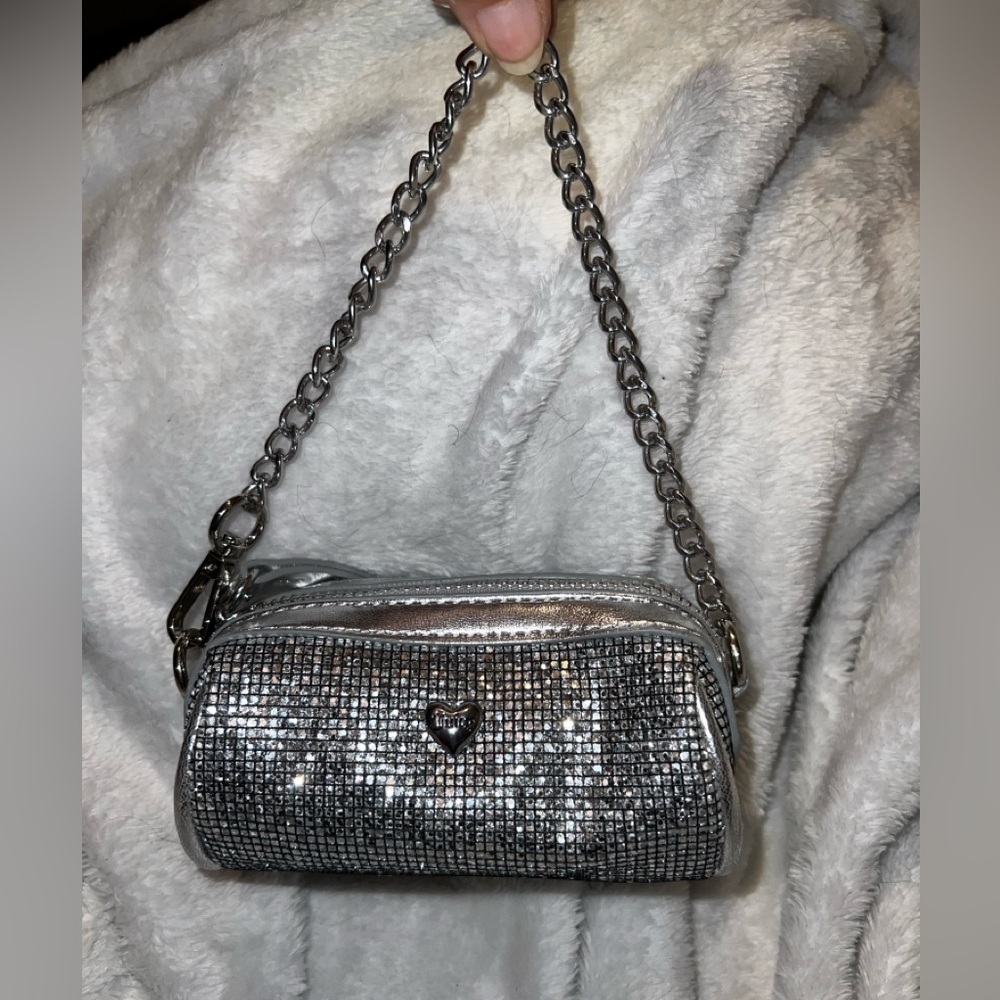 Small silver barrel style juicy couture coin bag